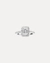 18CT EMERALD CUT DIAMOND PICCADILLY RING