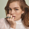 18CT LONDON BLUE TOPAZ, PINK MORGANITE, GREEN AMETHYST, BLUE TOPAZ & AQUAMARINE CLAUDE RING
